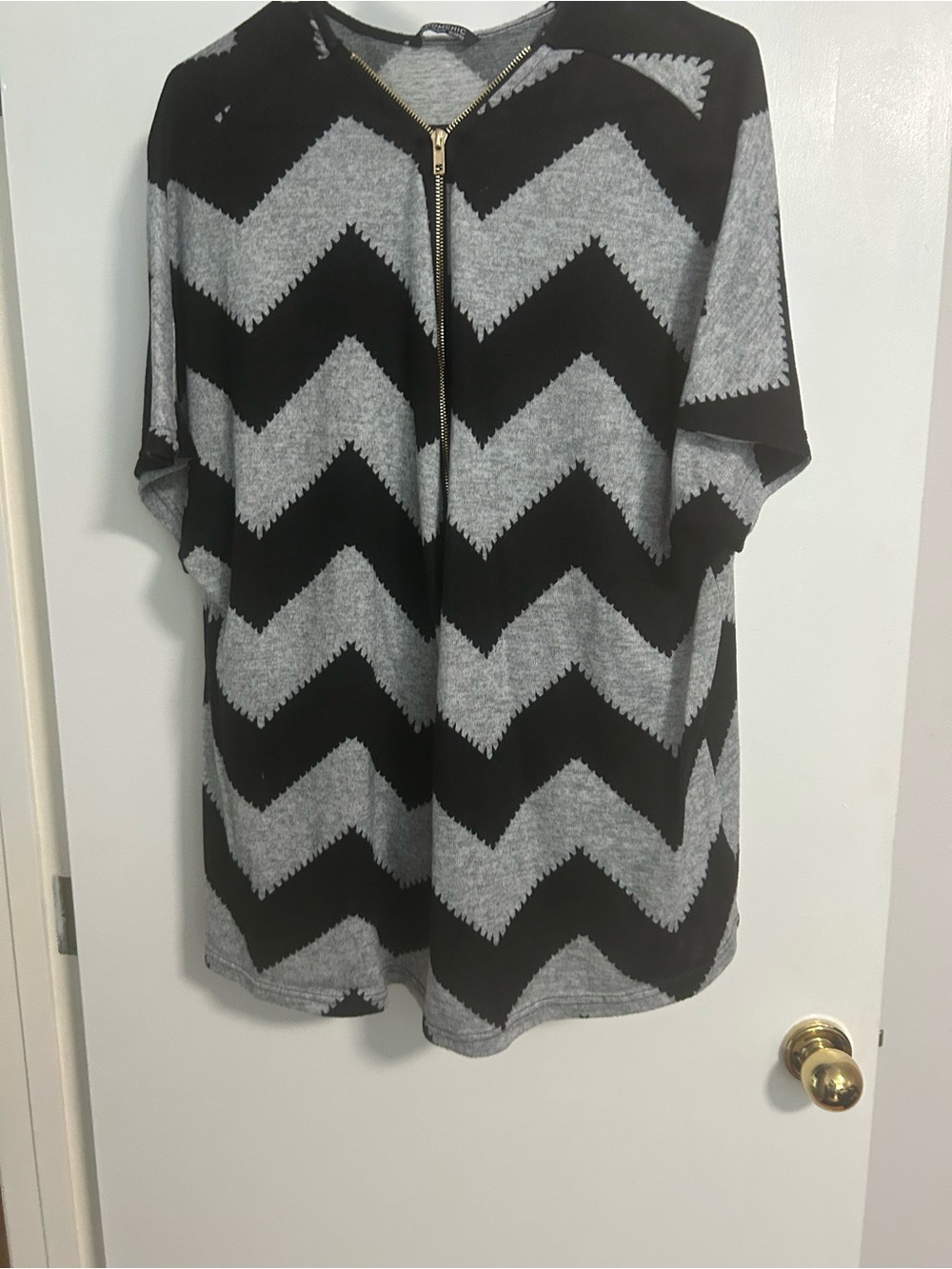 BloomChic Black and Gray Chevron Knit Top with Gold Zip